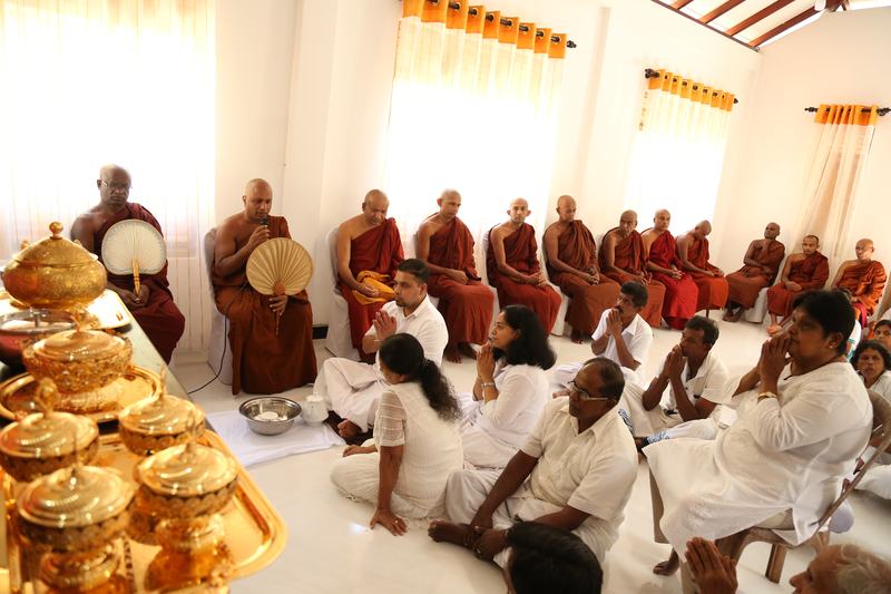 Monks chanting blessings for the devotees