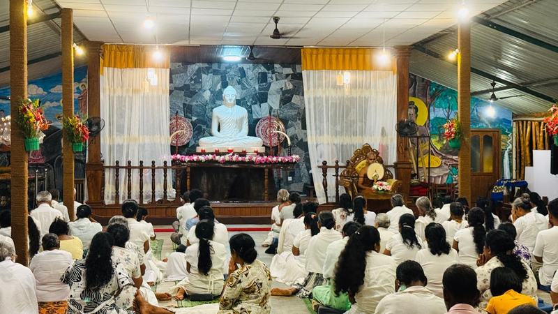 Dhamma sermon in the shrine hall
